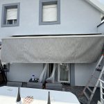 Changement d’une toile de store banne et lambrequin enroulable haut-de-gamme SATTLER Luméra LEAF à Colmar près d’Appenwihr.