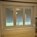 Installation d’un volet roulant à lames en aluminium double paroi et manoeuvre par treuil à Horbourg-Wihr près de Fortschwihr.