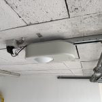 Remplacement rail d&rsquo;entraînement et moteur porte garage sectionnelle Colmar