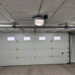 Remplacement rail d&rsquo;entraînement et moteur porte garage sectionnelle Colmar