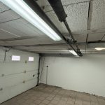 Remplacement rail d&rsquo;entraînement et moteur porte garage sectionnelle Colmar