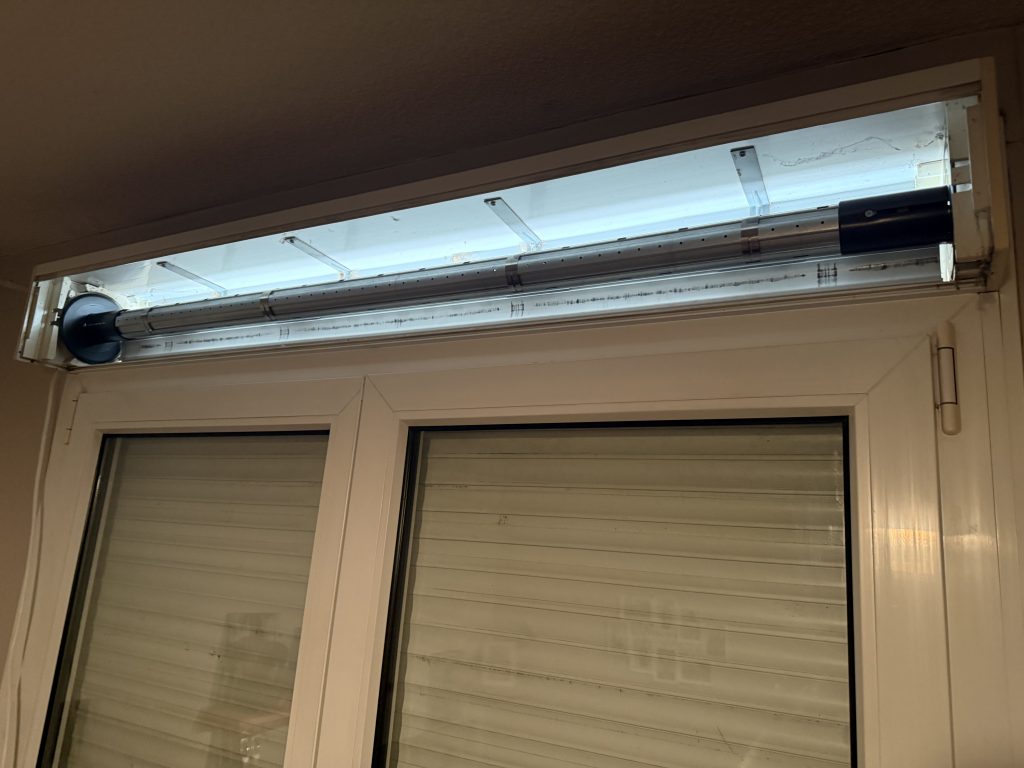 Pose d’un axe motorisé en lieu et place d’un volet roulant manuel à Guebwiller près de Orschwihr.